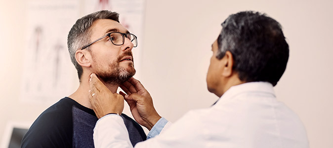 homem em consulta médica